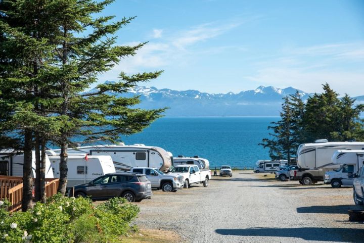 How to move a camper without a truck: camper RV park in front of a lake and mountains